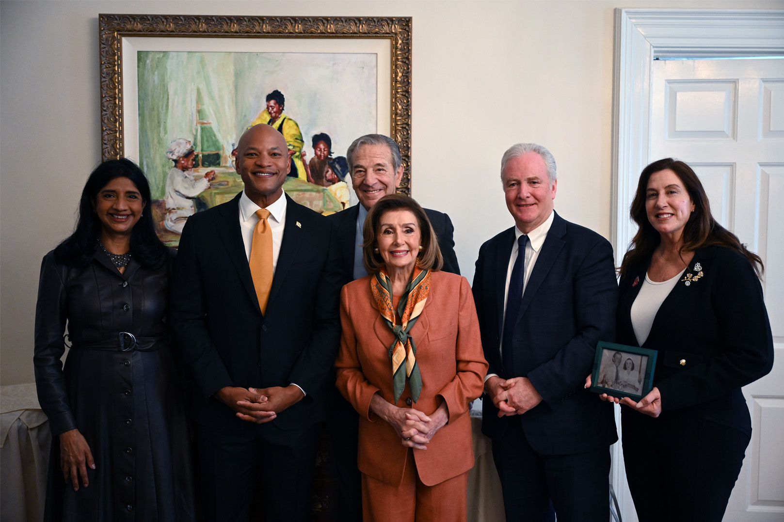 Speaker Pelosi poses for a photo