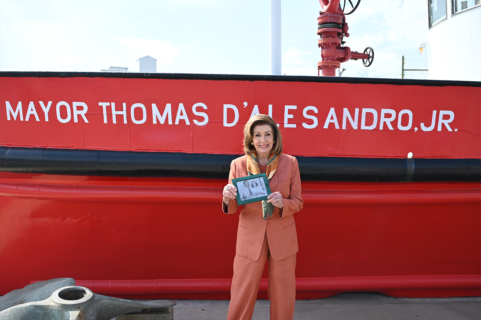 Speaker Pelosi poses for a photo