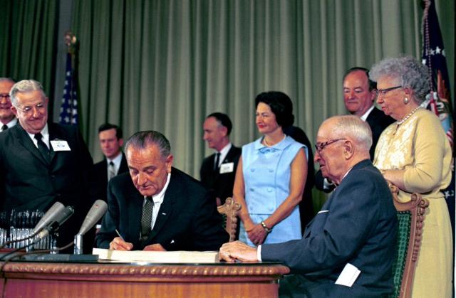 LBJ signed Medicare and Medicaid into law