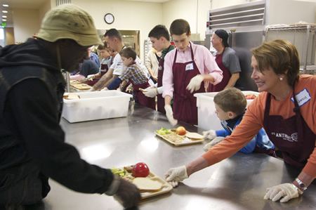 Congresswoman Pelosi serves meals at St. Anthony’s Dining Room in the Tenderloin during the Thanksgiving holiday.