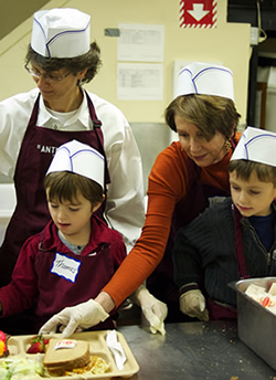 Congresswoman Pelosi Serves Meals at St. Anthony