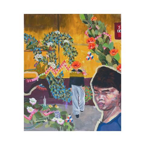 A boy stands in front of a yellow wall with vines and flowers